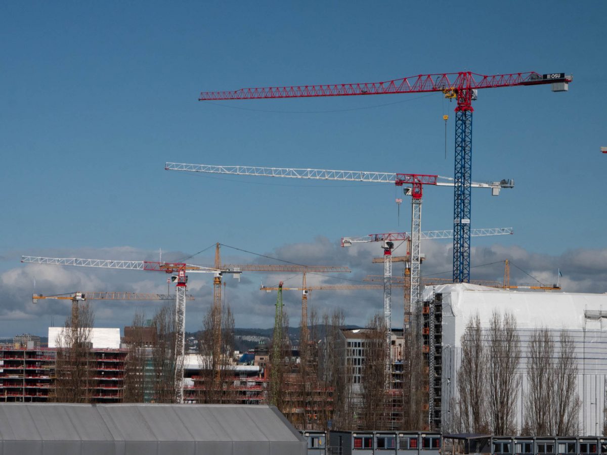 Oslo skyline with many cranes.