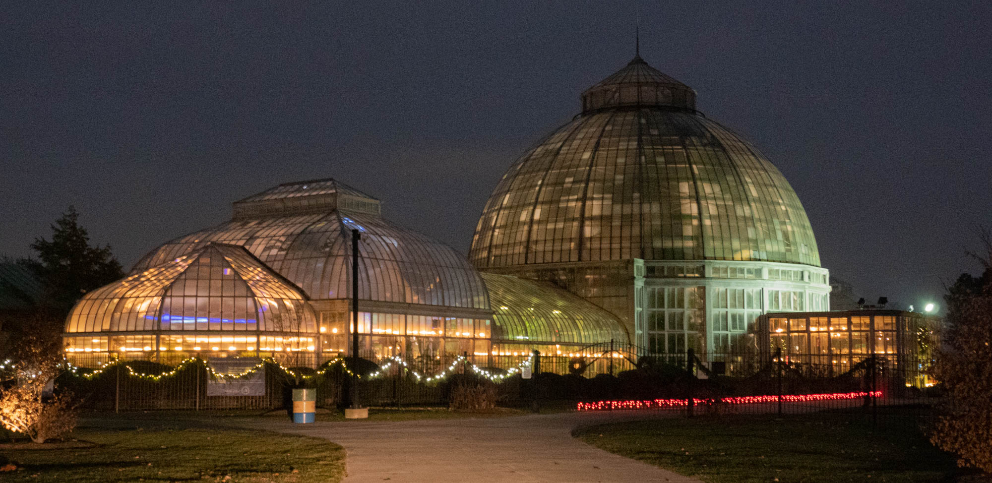 Belle Isle Conservatory lite up at night.