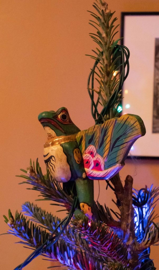 Decorative frog tree topper. 